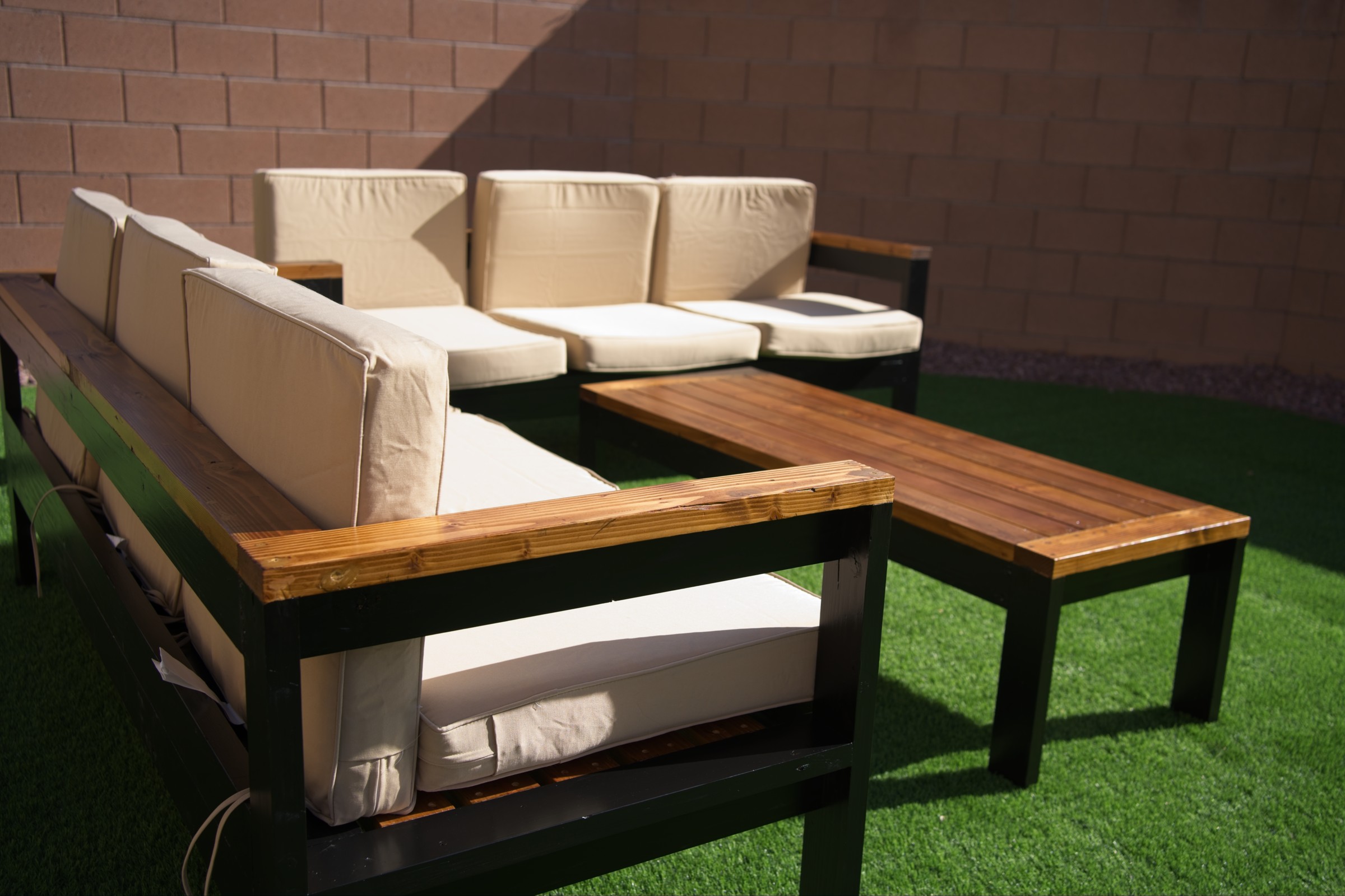 Modern Outdoor Sectional with Coffee Table - Image 2