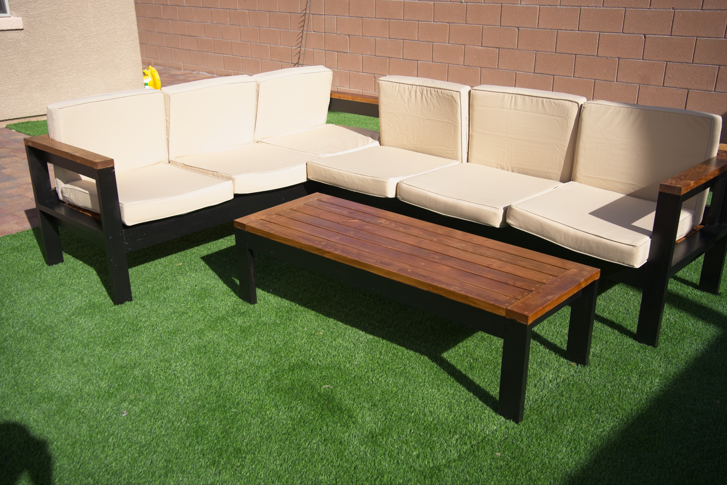 Modern Outdoor Sectional with Coffee Table - Image 5